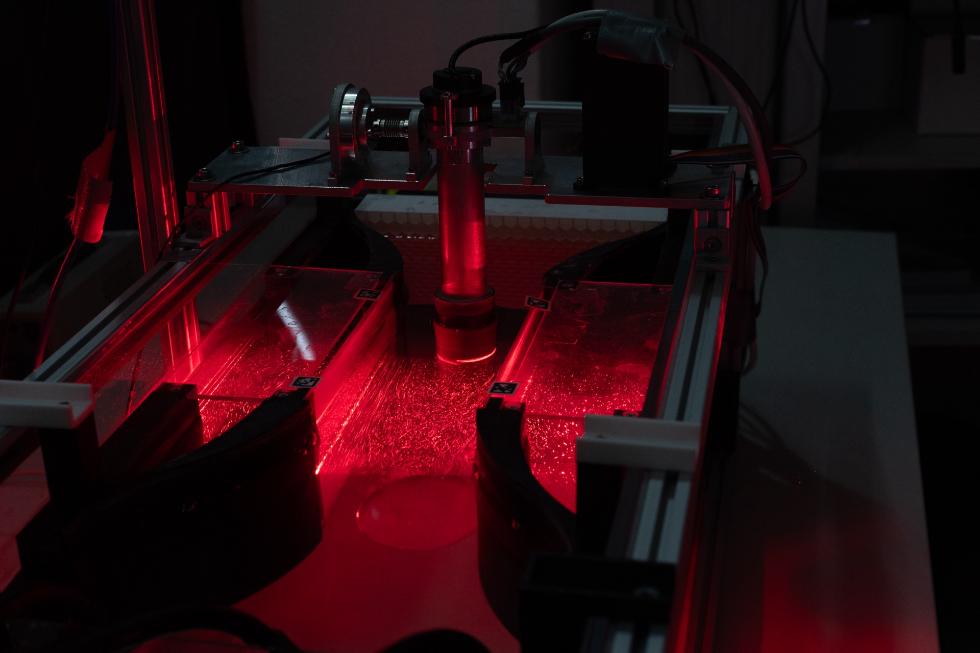 V0 test section illuminated by red laser sheet with particle seeding